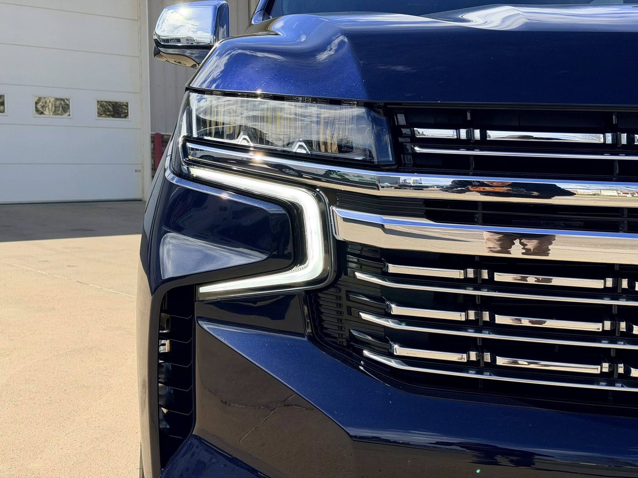 Glossy blue Chevrolet truck protected by Fine Details Auto Spa in Dickinson